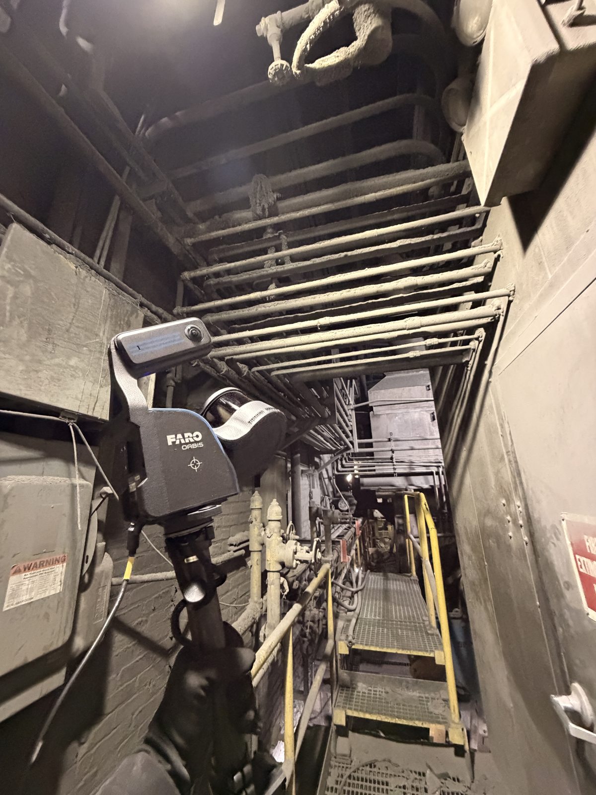 Scanner in a confined industrial pipe chase